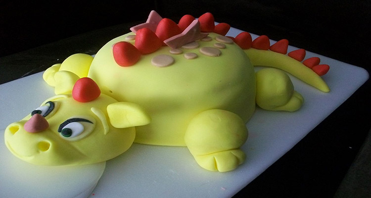 como hacer torta de dinosaurio